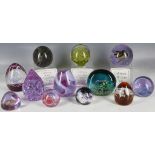 Twelve various glass paperweights (mostly Caithness)