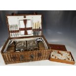 A 1930's wicker picnic set inc wicker cased decanters and a bone Mahjong set