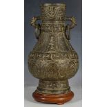 Chinese bronze vase, dragon and ring handles, archaic and character decoration, pear body, hollow,