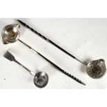 Two white metal (T.A.S.) spirit ladles incorporating coins i.e. Queen Anne 1707 and George III 1787,