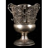 A Russian silver 3 handled cup with pierced side on socle bases by Peter Abrosimov