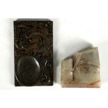 A Chinese brown jade with flecks paint mix palette, carved dragon decoration, 9.1cm wide, and a jade