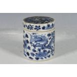 Chinese late 19th century lidded cylindrical jar, blue and white trailing flower and dragon