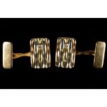 A pair of 18ct tri-colour gold cuff links, each se
