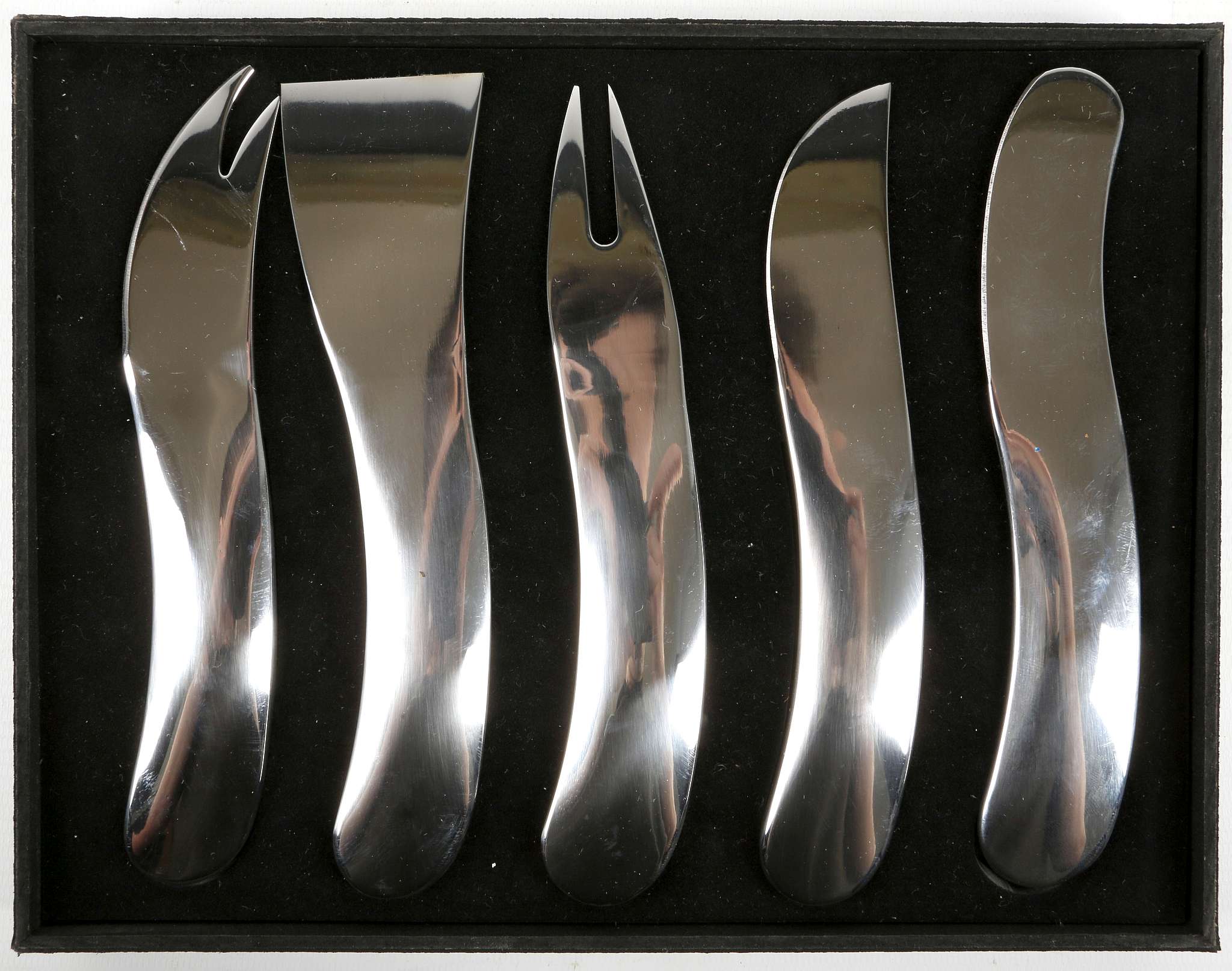 A contemporary cased set of stainless steel cheese knives and forks