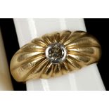 A 20ct gold (marked 835) and diamond set ring, the