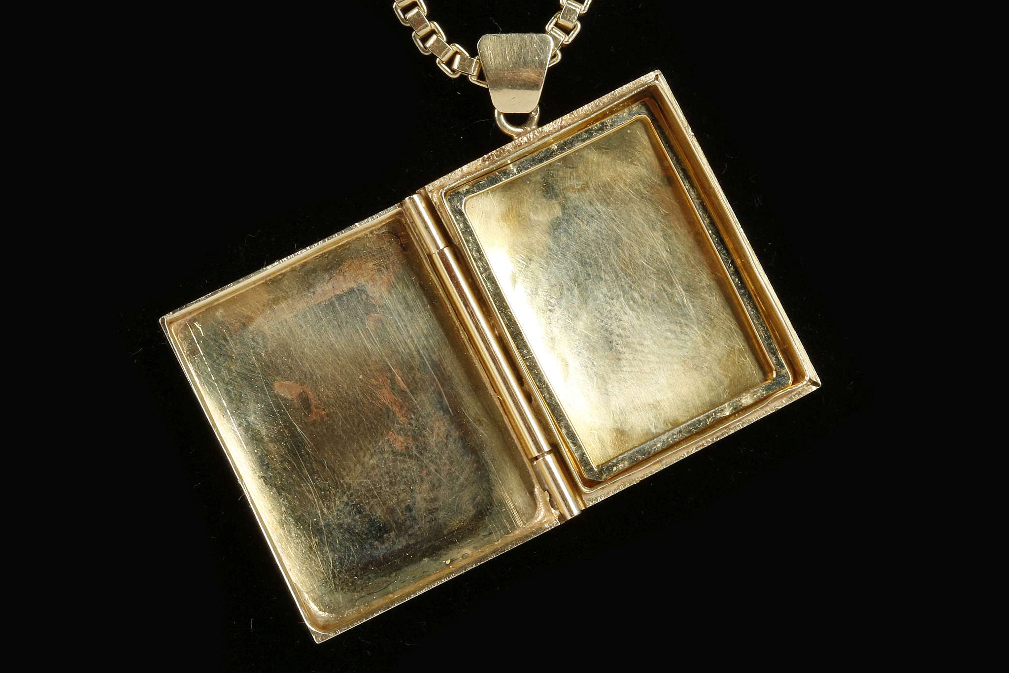 A 14k gold book-form locket, together with a heavy