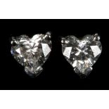 A pair of 18ct white gold and diamond ear studs, c