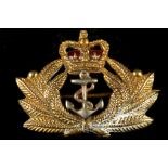 A 9ct gold and enamel Royal Navy cap badge brooch