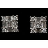 A pair of 18ct white gold and diamond ear studs, t