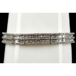 An 18ct white gold and diamond articulated bracele