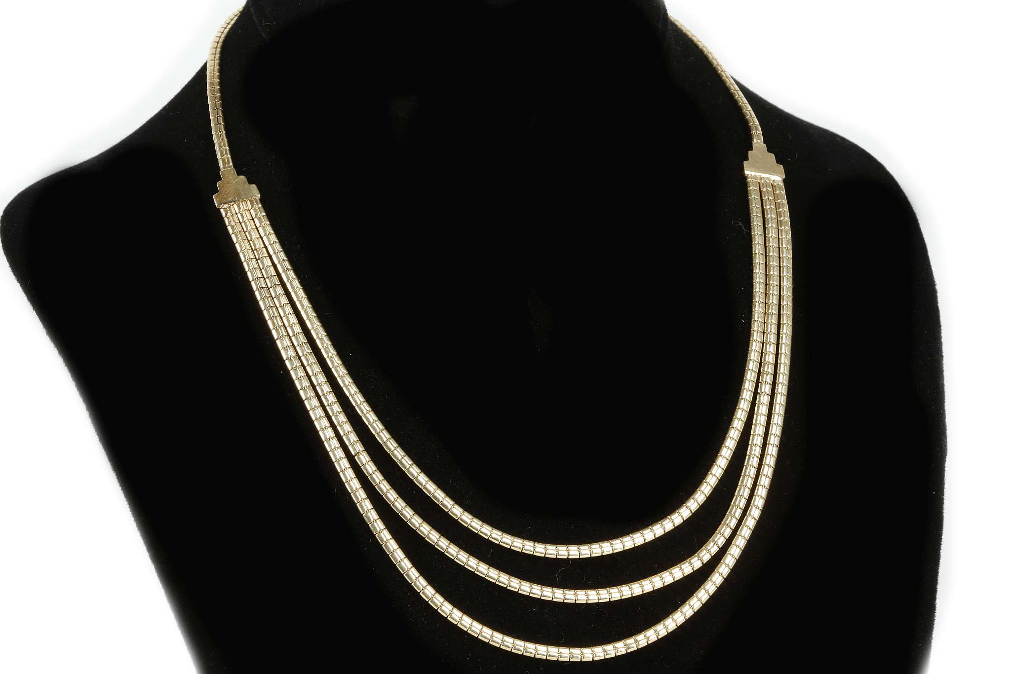 A 14k articulated necklace, with textured finish a