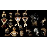 A collection of 12 various Blackamoor pin brooches