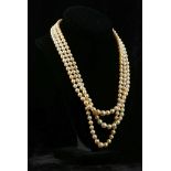 A triple stamped pearl necklace with white gold an