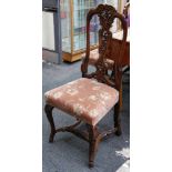 A set of 4 continental walnut stack dining chairs,