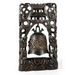 An oriental house temple  prayer bell; bronze bell