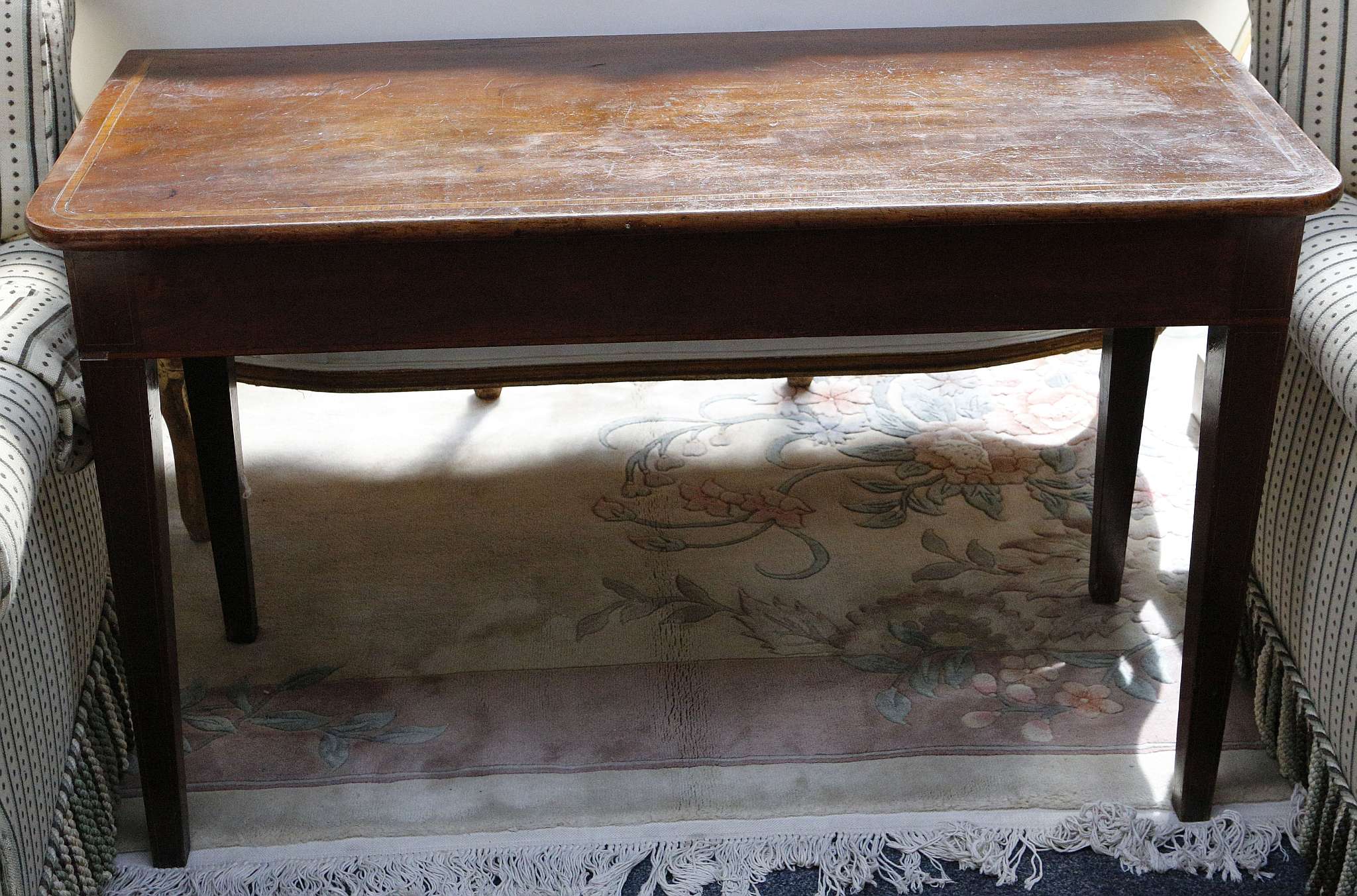 An Edwardian hall table, mahogany with satinwood cross banding, tapering box legs, 120.5cm wide