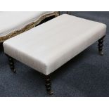 A contemporary lounge stool, cream silk seat, turn