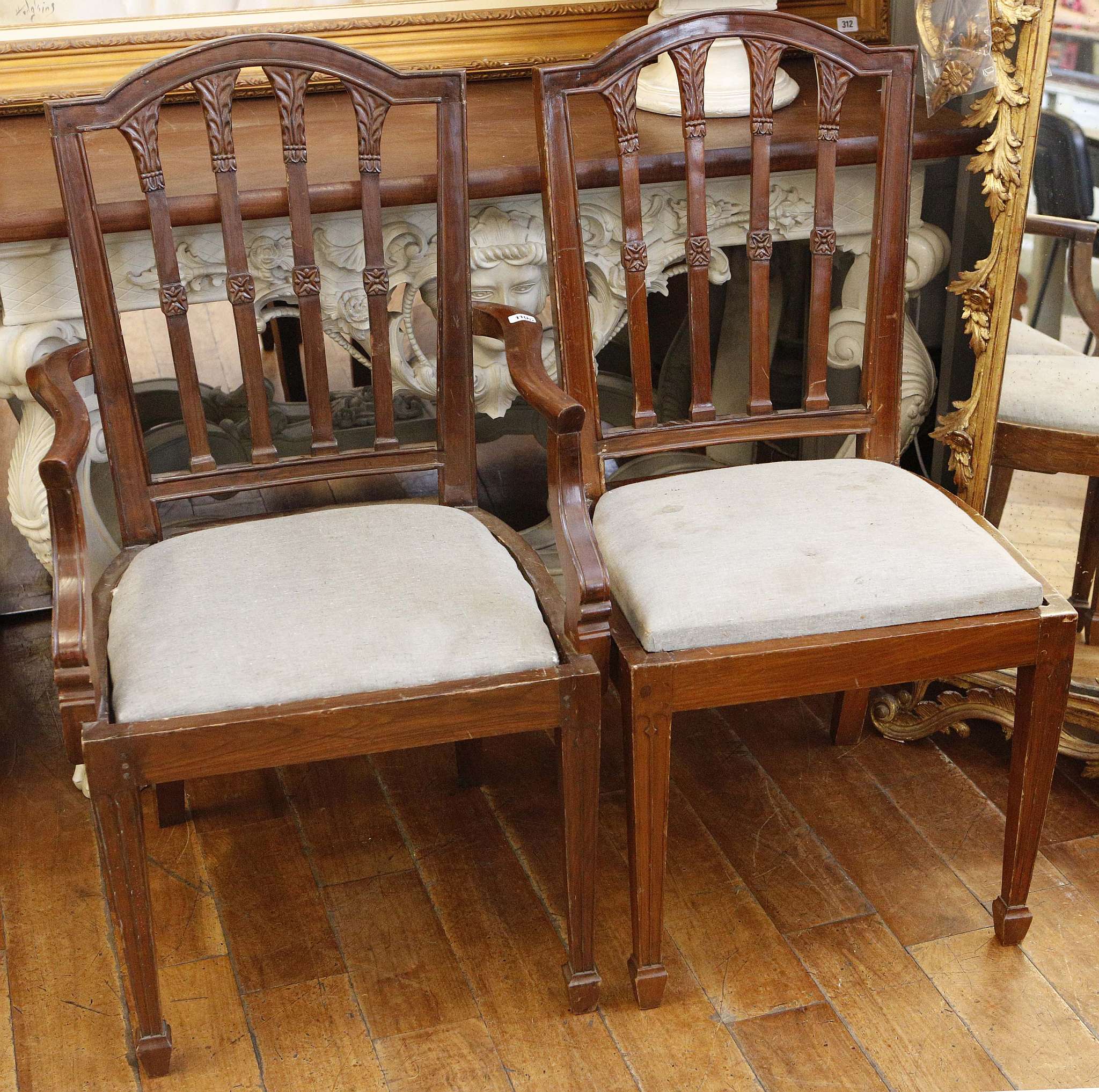 A set of 12 Edwardian dining chairs, stamped F.H.