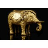 A CHINESE GILT BRONZE ELEPHANT PAPERWEIGHT.  Qing Dynasty, Qianlong era. Standing four-square with