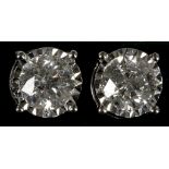 A pair of 18ct white gold and diamond studs, diamond: 2.05cts total