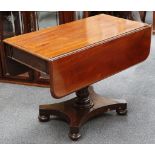 A 19th century mahogany Pembroke table, with a single drawer on a turned support quadripartite base,