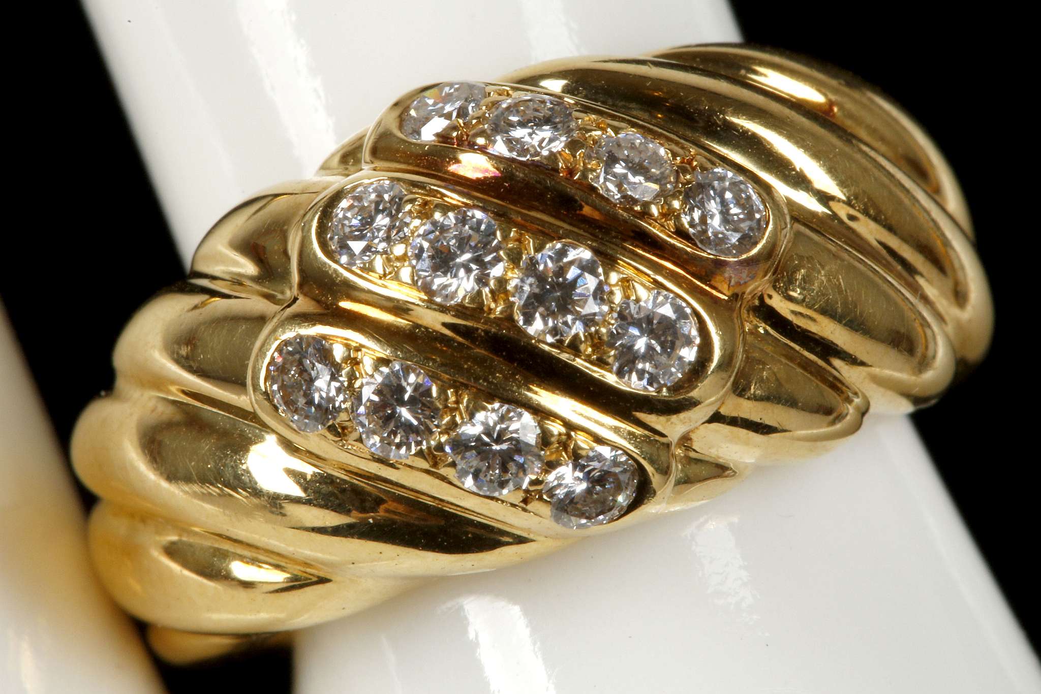 A continental 18ct gold and diamond set rope twist dress ring