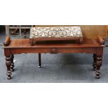 A 19th century window stool, scroll ends, shaped a