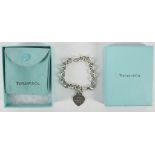 A Tiffany & Co silver ladies bracelet with heart shaped tag