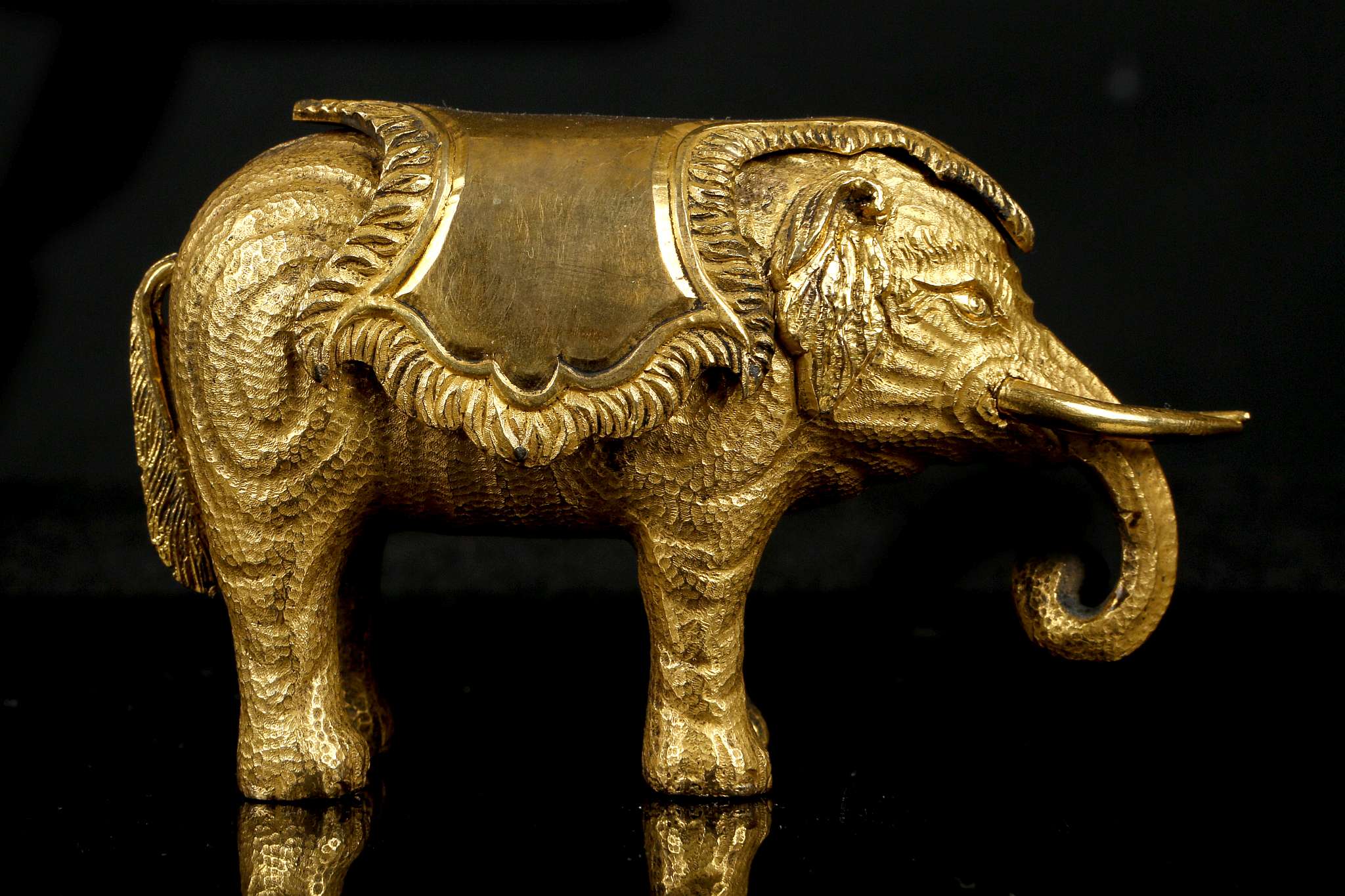 A CHINESE GILT BRONZE ELEPHANT PAPERWEIGHT.  Qing Dynasty, Qianlong era. Standing four-square with - Image 2 of 6