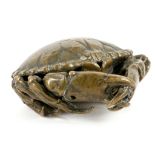A JAPANESE BRONZE MODEL OF A CRAB. Late Meiji. Naturalistically detailed and rolled into a ball with