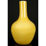 A CHINESE MONOCHROME YELLOW PEAR SHAPED VASE.  Late 19th / early 20th Century.  38cm H.  晚清 黄釉梨形瓶