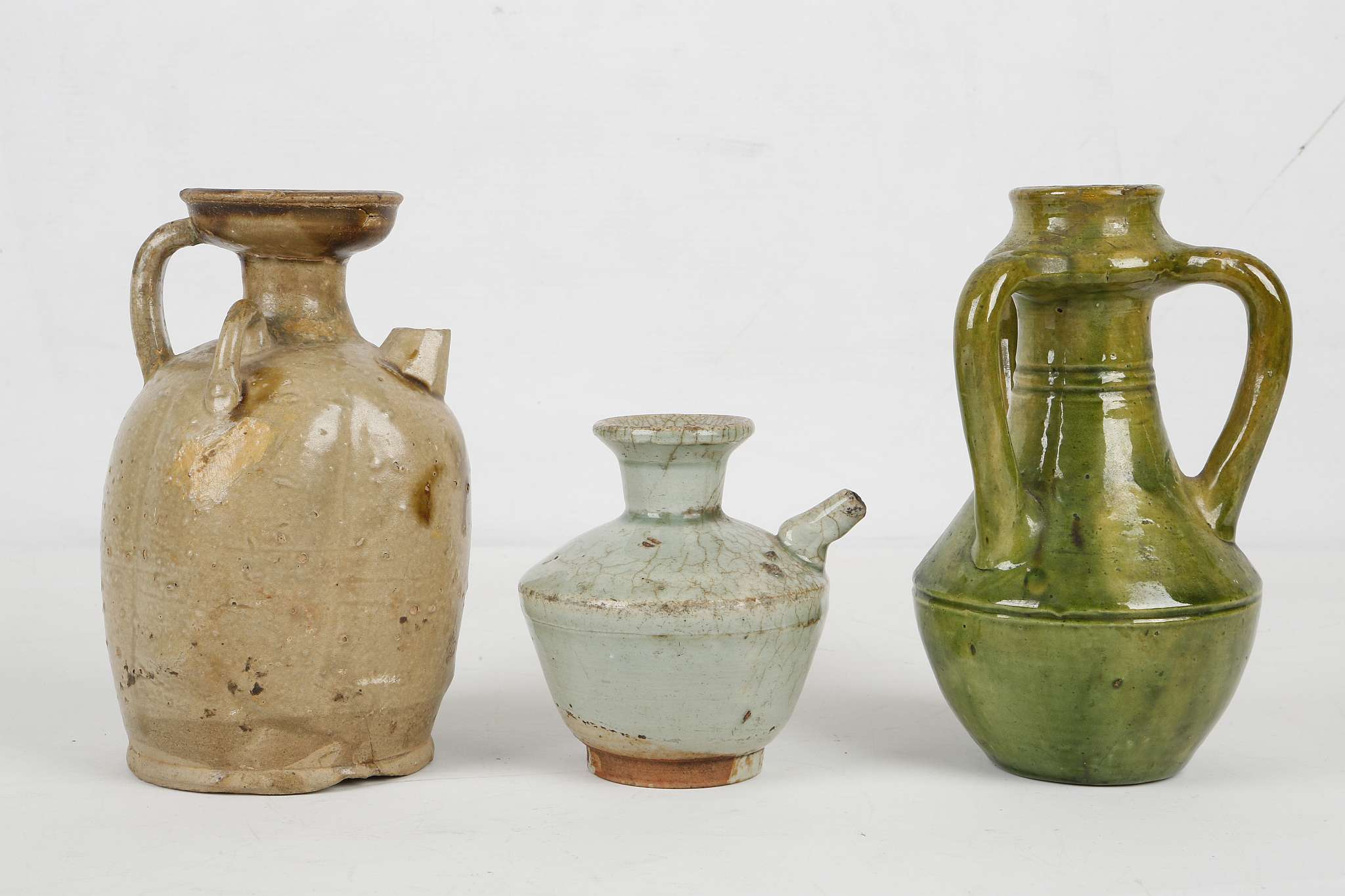 THREE CHINESE GLAZED STONEWARE CERAMICS. Tang Dynasty or later. Comprising an olive green glazed - Image 5 of 7