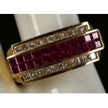A ruby and diamond dress ring in 18ct gold