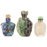 A COLLECTION OF THREE SNUFF BOTTLES. Late Qing. One of rock crystal carved on one side with a pine