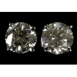 A pair of 14ct white gold fine quality diamond stud earrings (approx. 1ct)