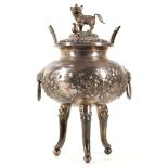 A CHINESE SILVER CENSER AND COVER.  Late Qing Dynasty.  The body supported by three slender feet