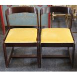 A pair of French 1960 dark stained beechwood upholstered seats