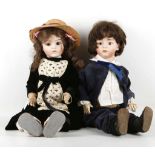 Two modern collectable porcelain head dolls