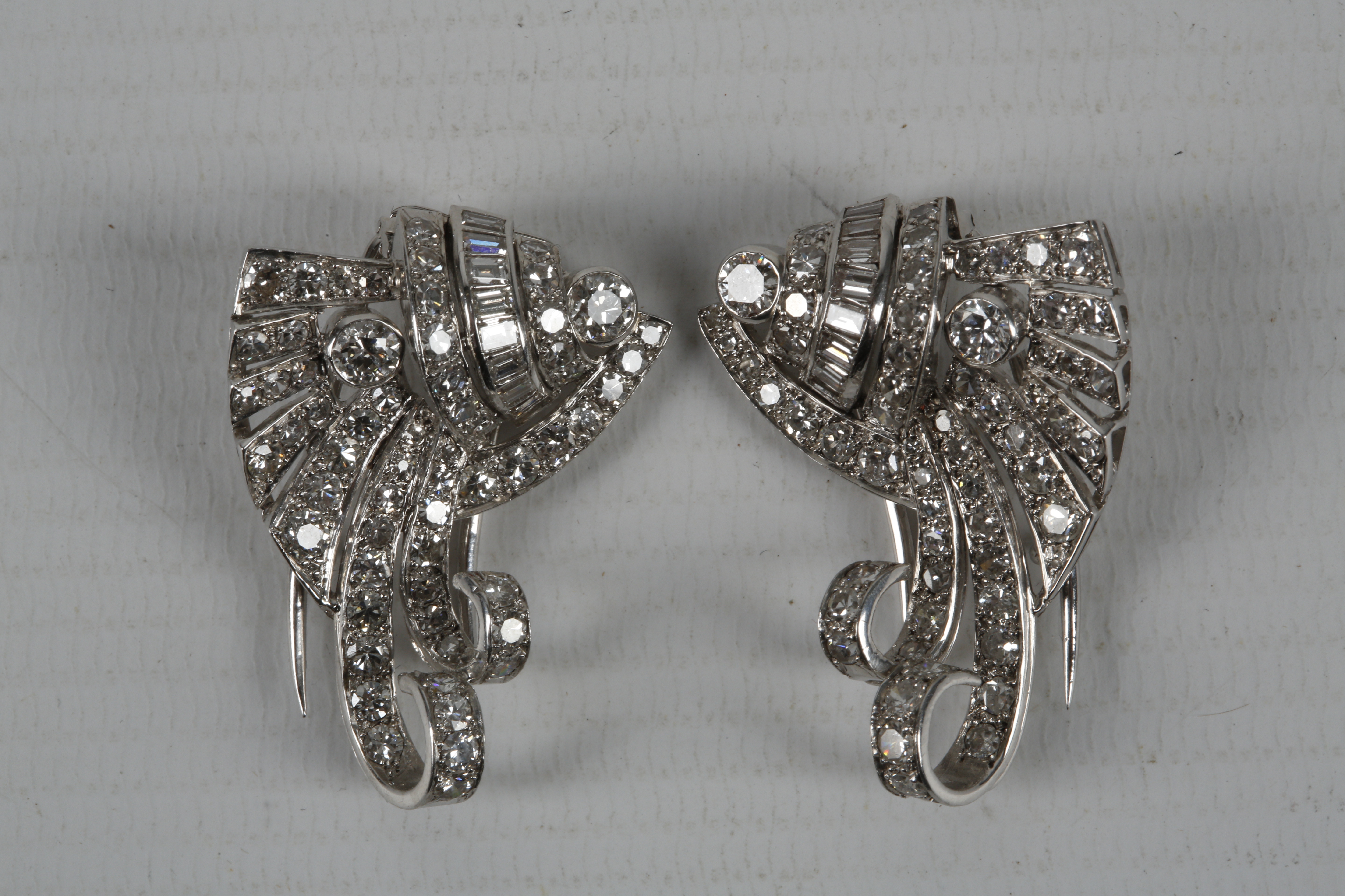 A platinum and diamond set pair of dress clips