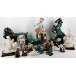 A collection of pottery and porcelain figures, inc