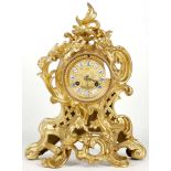 A 19th century French gilt metal mantel clock, wit