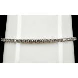 A 14ct white gold diamond line bracelet (2.63ct)