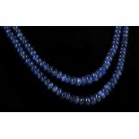 A sapphire bead necklace with diamond clasp