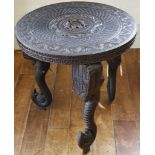 A late 19th dentury North Indian colonial yard wood side table, the legs carved with elephant's