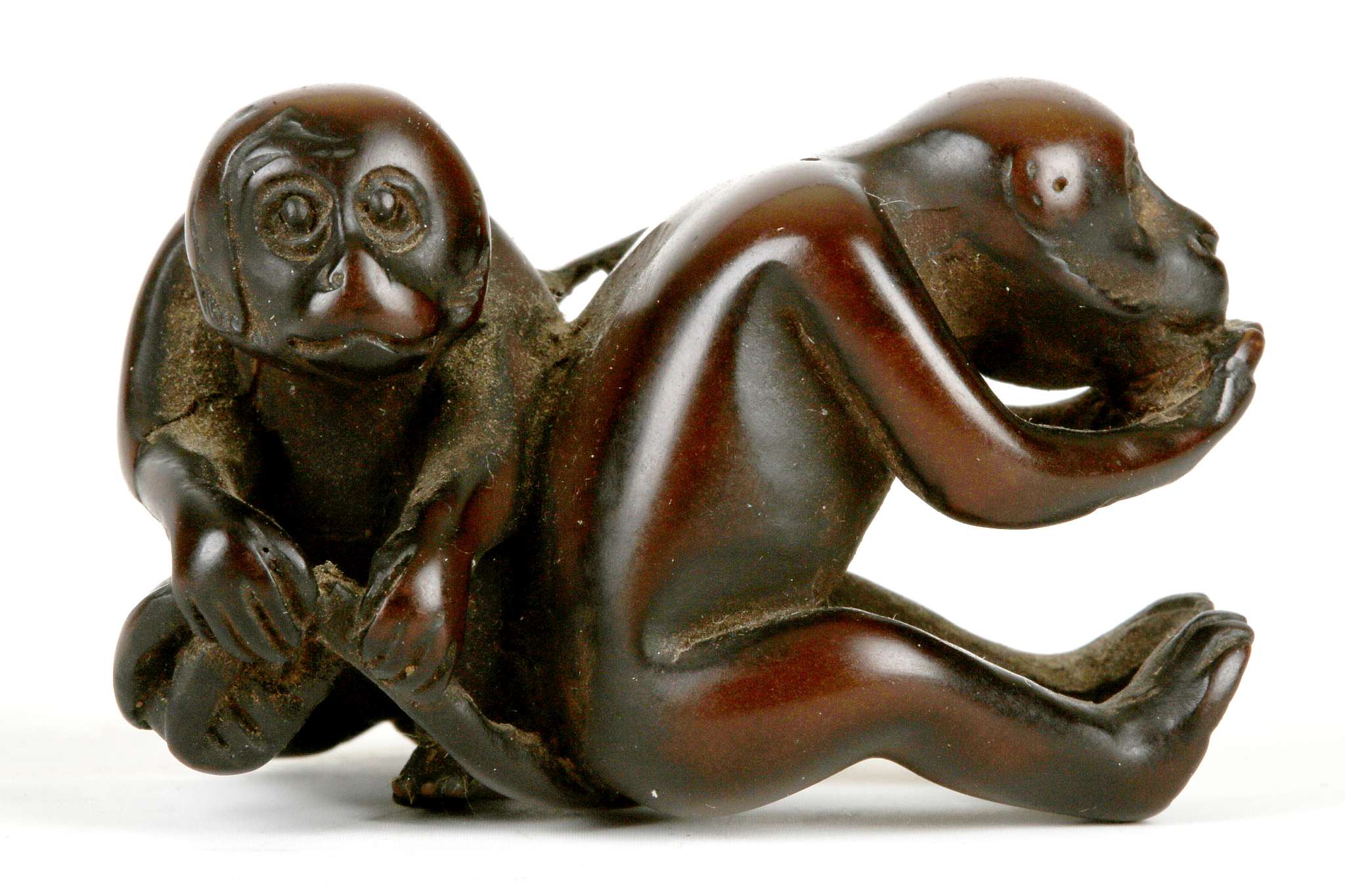 A JAPANESE BOXWOOD NETSUKE. Late Meiji.  Formed as