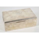 An early 20th century hallmarked silver cigar box and cover, London 1918