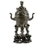 A CHINESE BRONZE ELEPHANT CENSER AND COVER.  Qing, 18th Century.  Cast with a pair of handles shaped