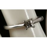 A platinum and diamond solitaire ring, certified 0.28ct, modified square brilliant cut stone, F -