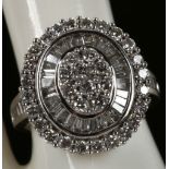 A large multi stone diamond cluster ring in white gold